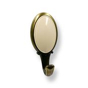 Immagine di portabiti s-1979 metallo/plast ottone ant/beige 77 a:34 h:29 int:24                                                                                           